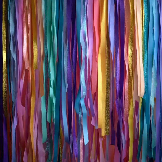 DIY Streamer Curtains That Shine in Happy Birthday Decorations - DIY Birthday Decor | Laravel